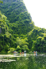 Ninh Binh, Vietnam - July 18, 2022 : Beautiful Natural Landscape In Trang An Landscape Complex Of Ninh Binh Province, Vietnam. Trang An Area Was Designated As A Dual UNESCO World Heritage Site.