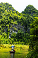 Ninh Binh, Vietnam - July 18, 2022 : Beautiful Natural Landscape In Trang An Landscape Complex Of Ninh Binh Province, Vietnam. Trang An Area Was Designated As A Dual UNESCO World Heritage Site.