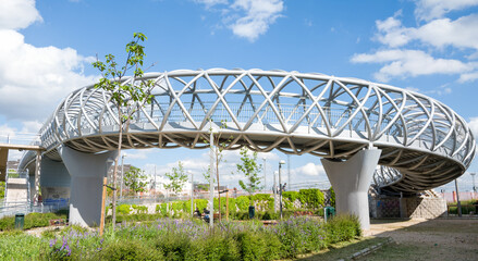 A curve bridge in a park in the city
