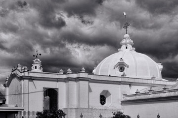 White church, dark sky