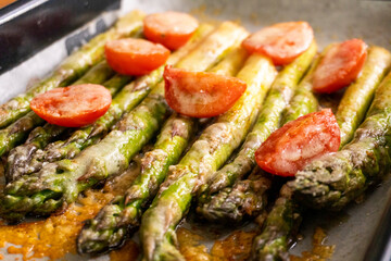 asparagus with tomatoes and cheese. diet. food concept