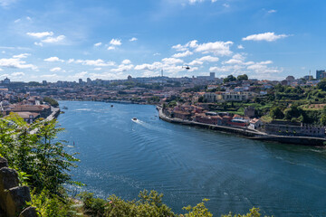 Obraz premium View of the Douro river at Porto on a sunny day