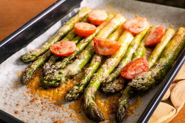 asparagus with tomatoes and cheese. diet. food concept