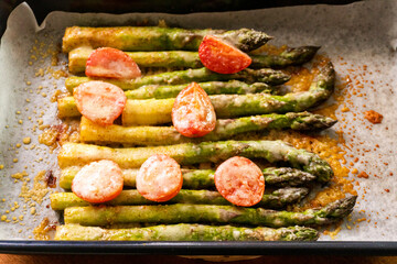 asparagus with tomatoes and cheese. diet. food concept