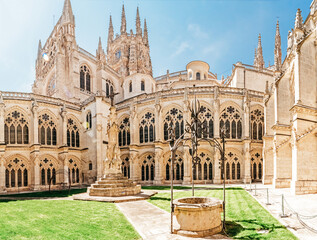 Panoramic view of the cloister courtyard of the Cathedral of Burgos, Spain, showcasing elaborate...