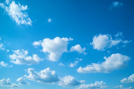 Sunny day, fluffy clouds, bright blue sky, outdoor scene