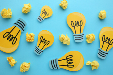 Creative thinking ideas and innovation concepts. Yellow coloured light bulb on the background