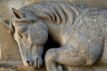 Fototapeta premium Detailed stone carving of a horse's head and neck.