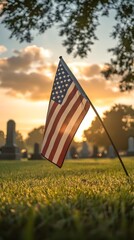 American flag in a cemetery at sunrise