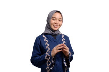 Portrait of smiling young Asian Muslim woman holding hands together and feeling confident isolated on transparent background