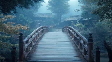Fototapeta premium Ancient wooden bridge in a misty Japanese village