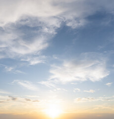 Obraz premium Front view and full frame of beautiful morning or evening blue and orange sky with cloudy while sunsets or sunrises taken at the sea used as natural blackground texture