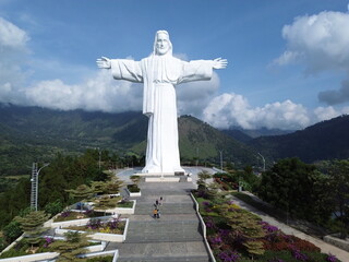 Samosir, Indonesia &ndash; April 28, 2025: Aerial view of the 61-meter-tall Jesus Christ statue at Sibea-bea Hill, the tallest in the world, overlooking Lake Toba