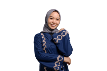 Smiling young Asian Muslim woman looking at camera feeling confident and happy isolated on transparent background