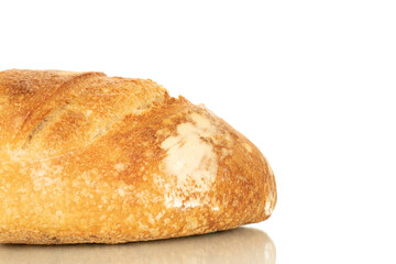 One half of a loaf of bread isolated on a white background, close-up.