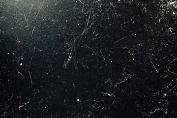 Scratched dark surface texture with light leak