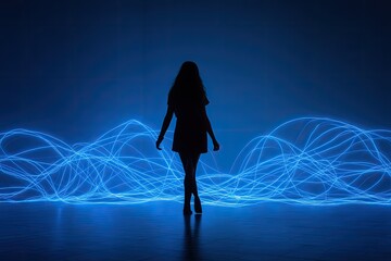 Silhouette of a woman, vibrant blue light trails