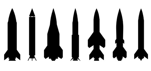 Silhouettes of ballistic missiles and rockets of various designs and sizes, displayed vertically isolated on transparent background. Military arsenal, strategic weapons, missile technology. War visual