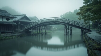 Ancient wooden bridge in a misty Japanese village