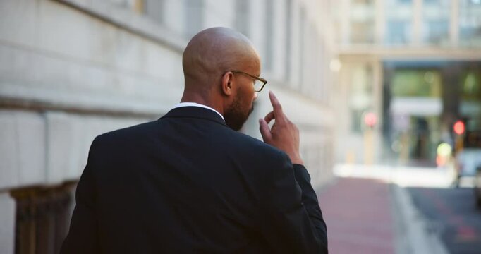 Walking, back and business man in city for attorney, legal representative or professional. Corporate lawyer, solicitor or advisor with person outdoor for advocate consultant and courtroom appointment