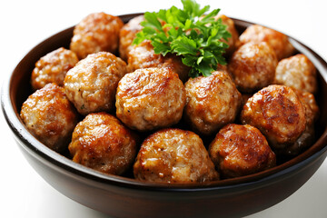 Delicious and appetizing close up view of tasty meatballs served in a ceramic bowl