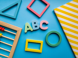 Colorful educational materials featuring shapes and letters for back to school mathematics