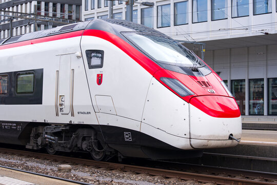 Stadler train with coat of arms of Canton Glarus parked at Hauptbahnhof main railway station of Swiss City of Z&uuml;rich on a cloudy spring day. Photo taken May 8th, 2025, Zurich, Switzerland.