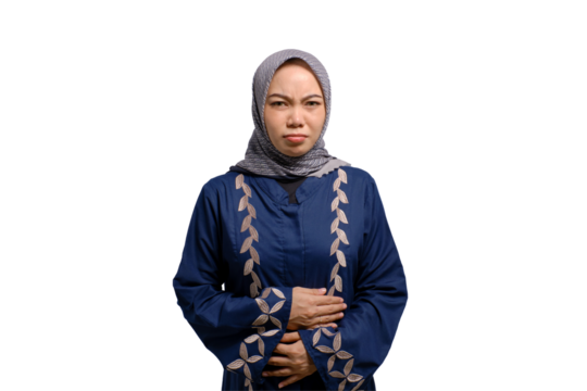 Unhealthy young Asian Muslim woman touching belly, having stomach pain isolated on transparent background
