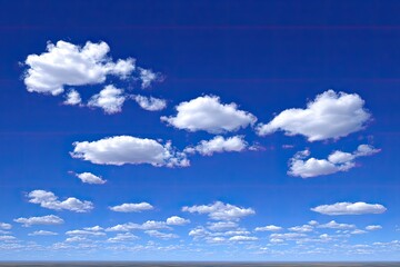 Clouds in a clear blue sky