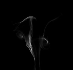 Close-up photo set of incense smoke or abstract white vapor floating on black background. Fog and...