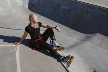 Woman Rollerblading in Skate Park as Part of Daily Fitness Routine, Promoting 10K Steps and Active...