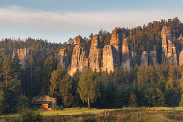Adrspach-Teplice Rocks, sandstone formations in Hradec Kralove Region in Czech Republic, Europe. Scenic view of towering rock formations surrounded by lush greenery, creating a natural landscape