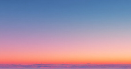 Fototapeta premium Pastel sunset over a sea of clouds.