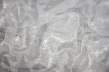 Extreme macro of plastic bubble wrap texture. Selective soft focus, shallow depth of field. Abstract dreamy background