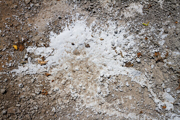 Concrete and cement stains on ground. Abstract messy construction background