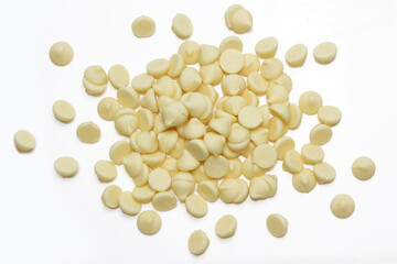 White Chocolate Chips in a pile on white background