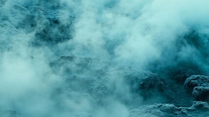 Obraz premium Ethereal Mist and Fog Over a Mysterious Landscape in Cyan Tones