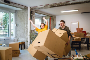 funny accident with man and woman hit each other with boxes at new home