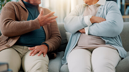 Hands, couple and argument on sofa at house for fighting, divorce conflict and partner...