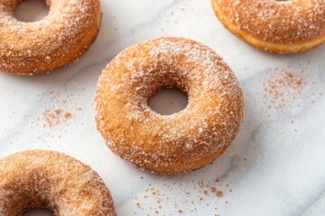 Freshly Baked Sugar-Coated Donuts on Marble Surface