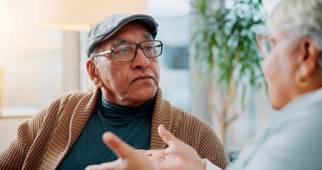 Elderly couple, fighting and sofa at house for argument, divorce conflict and partner disagreement....