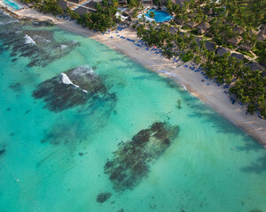 Drone view of Caribbean sea,sandy beach, and luxury resort at sunny day ,coastline of Bayahibe...