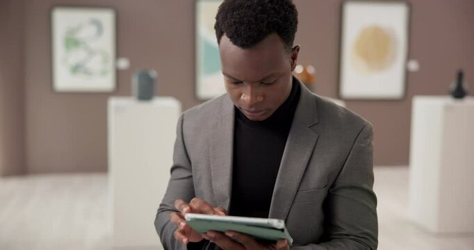 Art, tablet and black man at exhibition with search, culture and online review of creative business. Gallery, sales agent and curator on digital app at presentation, auction or showroom with research