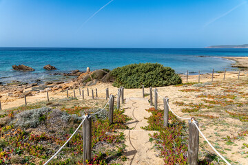 Sandy Path to Rocky Beach in Portu Maga