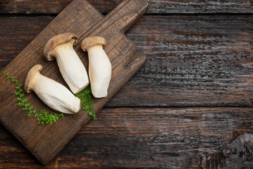 King Oyster Mushroom, Eryngii mushrooms on wooden board