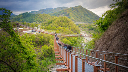 Y-shaped suspension or swaying bridge between the mountain and the valley. Hantan river, Gangwon-do, South Korea