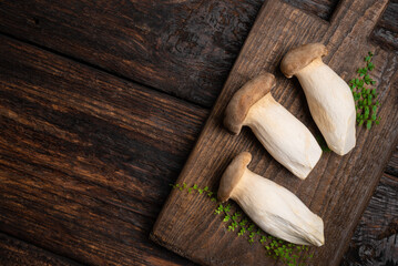 King Oyster Mushroom, Eryngii mushrooms on wooden board