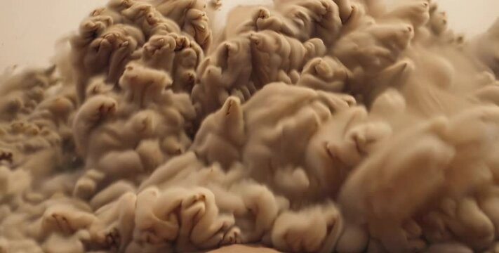 Massive sand explosion effect in desert, dynamic animated dust cloud eruption in cinematic video, background