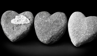 Obraz premium Three heart-shaped stones