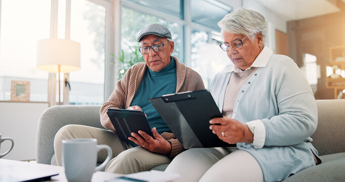 Senior couple, tablet and clipboard at house for finance planning, review bills and payment checklist. Elderly people, digital and document for investment, insurance application and asset management